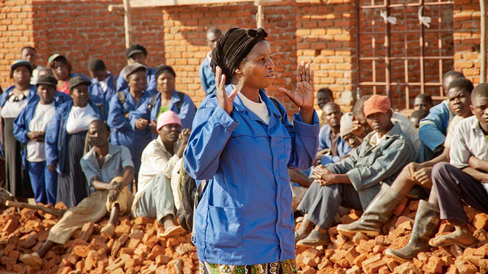 Woman with crowd in background