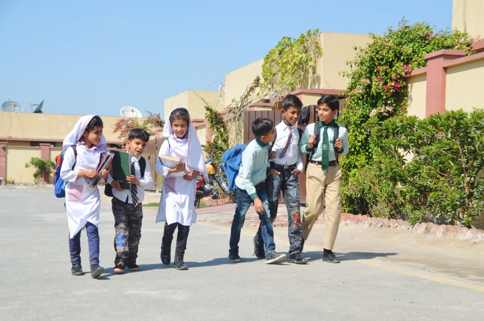A group of children on their way to school