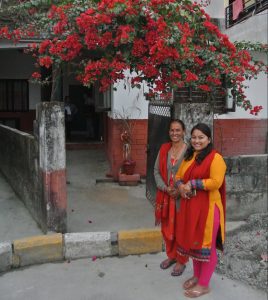 Adhinaj Kunwan and her Mother outside their new home