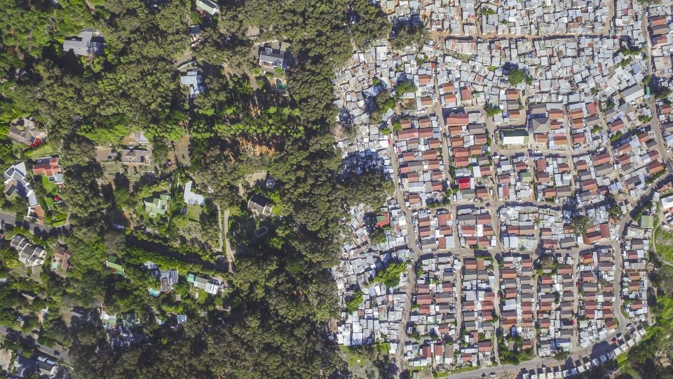 Earth Day: Overhead image showing half Rural and hald Urban landscape